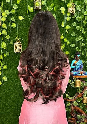 Medium layered hair extension with burgundy highlights