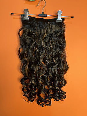 Medium length curled hair extention Medium length curled hair extention